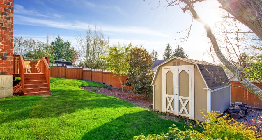 Fenced backyard with storage shed in Cincinnati